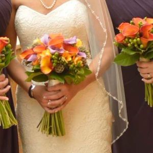 Beautifully beaded single layer fingertip veil